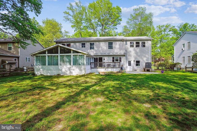 813 Petinot Pl, Stevensville, MD 21666 - back of property featuring a sunroom and a patio