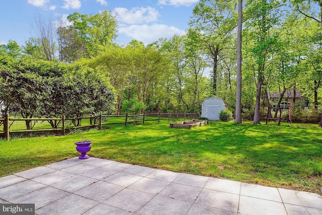 813 Petinot Pl, Stevensville, MD 21666 - view of yard with a patio and a vegetable garden