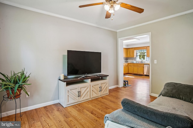 813 Petinot Pl, Stevensville, MD 21666 - living room with light wood finished floors, a ceiling fan, crown molding, and baseboards
