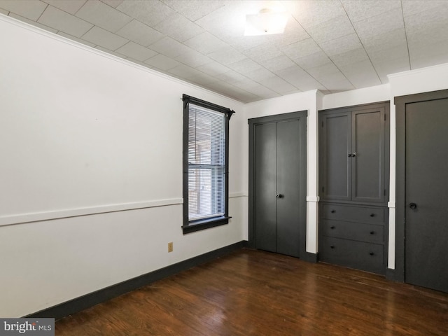 2297 Big Cove Tannery Rd, Big Cove Tannery, PA 17212 - unfurnished bedroom with dark wood-type flooring and baseboards