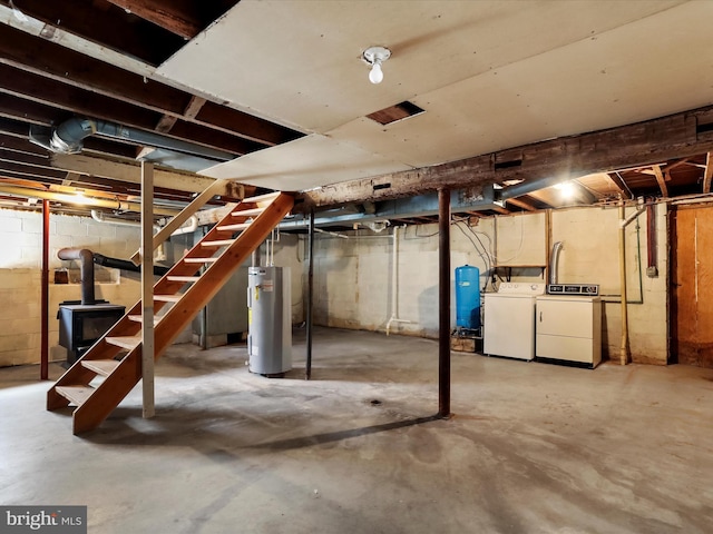 2297 Big Cove Tannery Rd, Big Cove Tannery, PA 17212 - unfinished below grade area with washing machine and clothes dryer, water heater, and stairway