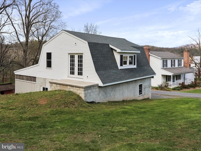 2297 Big Cove Tannery Rd, Big Cove Tannery, PA 17212 - view of side of home featuring a yard, french doors, roof with shingles, and a gambrel roof