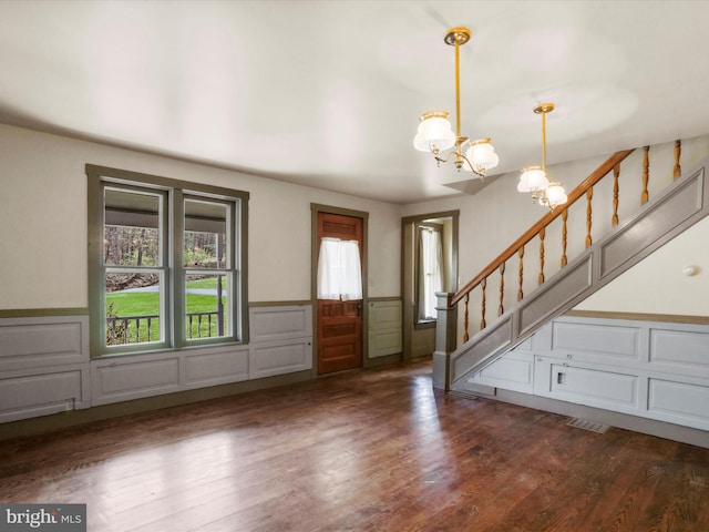 2297 Big Cove Tannery Rd, Big Cove Tannery, PA 17212 - foyer featuring wainscoting, visible vents, a notable chandelier, wood finished floors, and stairway
