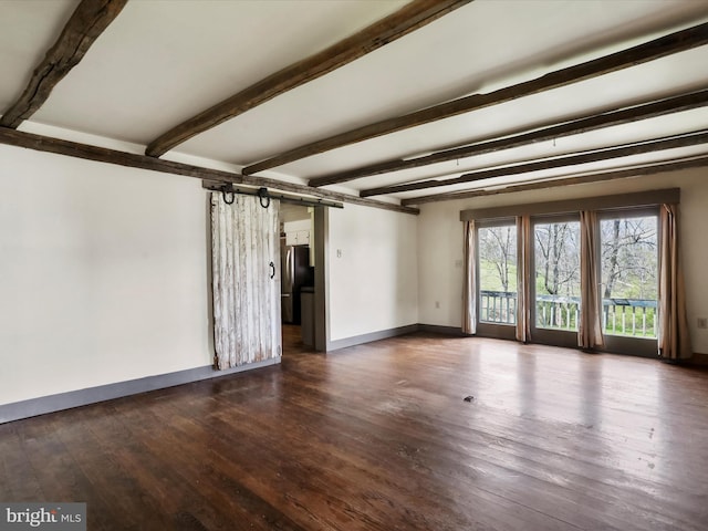 2297 Big Cove Tannery Rd, Big Cove Tannery, PA 17212 - unfurnished living room featuring a barn door, baseboards, beamed ceiling, and dark wood-style floors