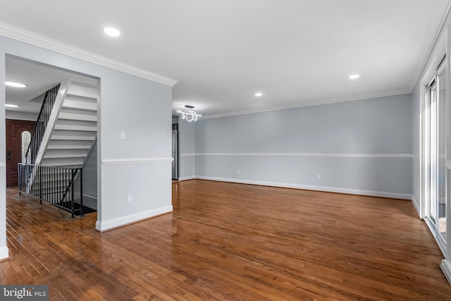 unfurnished living room featuring baseboards, crown molding, wood finished floors, and recessed lighting