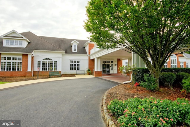 view of building exterior featuring driveway