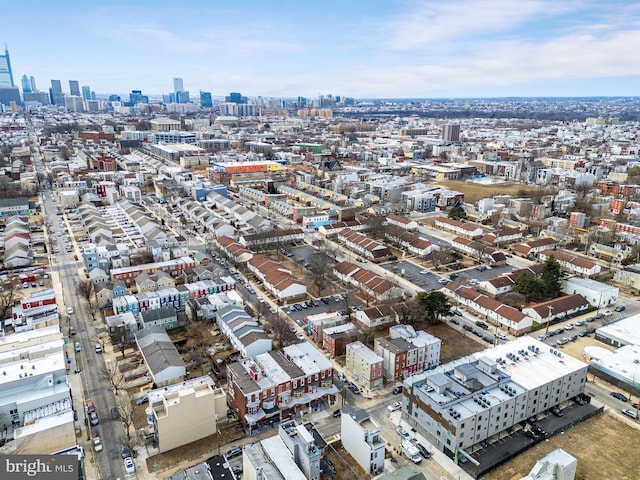 birds eye view of property featuring a city view