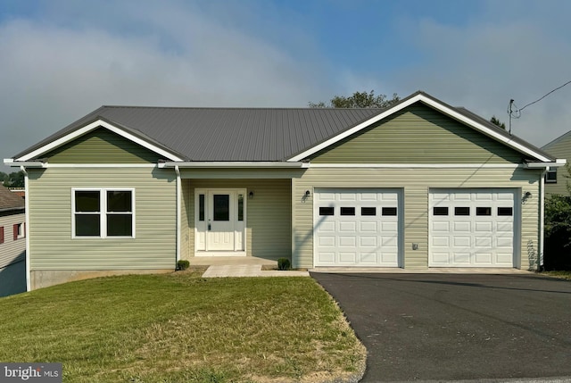 531 E High St, Bellefonte, PA 16823 - ranch-style house with a front lawn, driveway, metal roof, and a garage