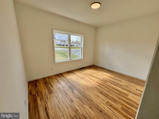 531 E High St, Bellefonte, PA 16823 - empty room with baseboards and light wood-type flooring