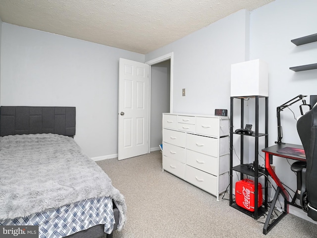 8554 Koluder Ct, Lorton, VA 22079 - carpeted bedroom featuring a textured ceiling and baseboards