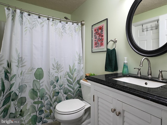 8554 Koluder Ct, Lorton, VA 22079 - bathroom featuring a textured ceiling, toilet, vanity, and a shower with shower curtain