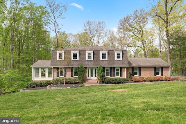 1004 Union Church Rd, Mclean, VA 22102 - front facade with roof with shingles, a front lawn, and brick siding