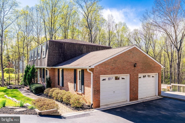 1004 Union Church Rd, Mclean, VA 22102 - view of home's exterior with roof with shingles and brick siding