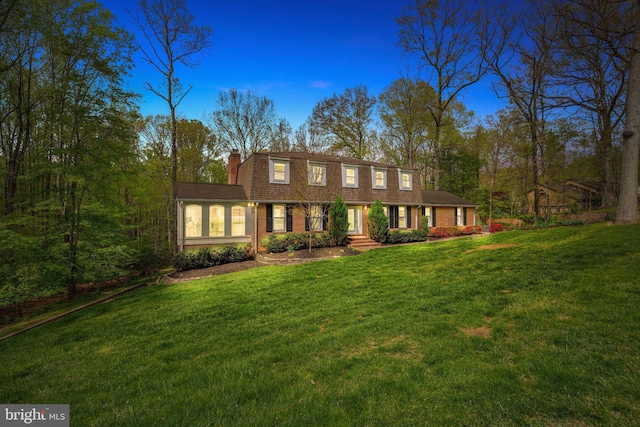 1004 Union Church Rd, Mclean, VA 22102 - view of front of property featuring roof with shingles, a chimney, a front yard, and brick siding