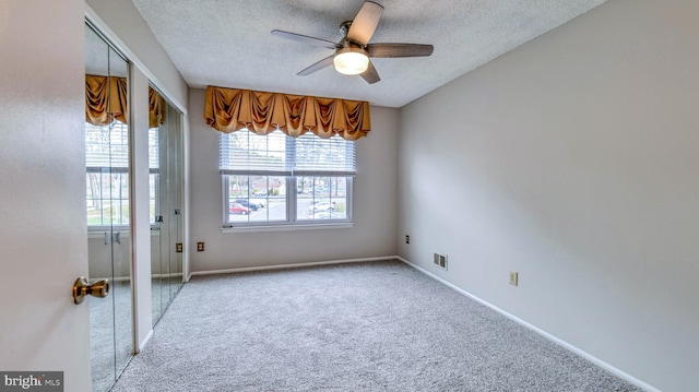 68 Arapaho Pl, Galloway, NJ 08205 - carpeted empty room featuring visible vents, a ceiling fan, baseboards, and a textured ceiling