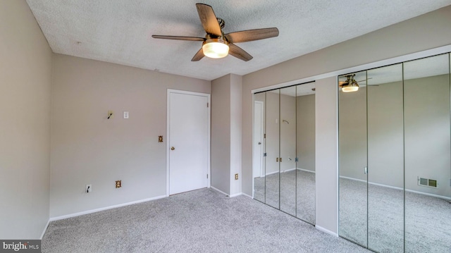 68 Arapaho Pl, Galloway, NJ 08205 - unfurnished bedroom with multiple closets, visible vents, a ceiling fan, a textured ceiling, and carpet flooring