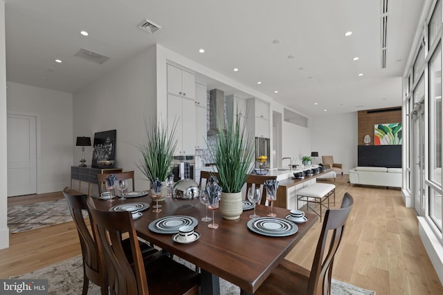 101 N Queen St Unit 402, Lancaster, PA 17603 - dining area with recessed lighting, light wood-style floors, and visible vents