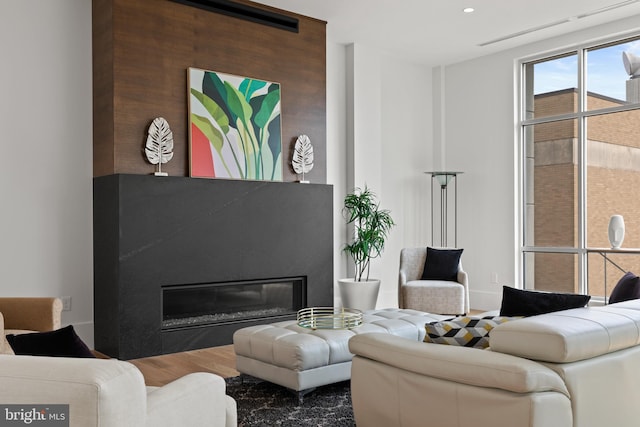 101 N Queen St Unit 402, Lancaster, PA 17603 - living area with a high end fireplace and wood finished floors