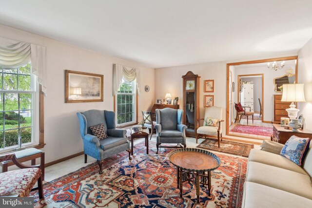 9 Still Run Dr, Mickleton, NJ 08056 - living area featuring baseboards and a notable chandelier