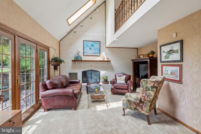 9 Still Run Dr, Mickleton, NJ 08056 - living area with a brick fireplace, baseboards, high vaulted ceiling, carpet, and a skylight