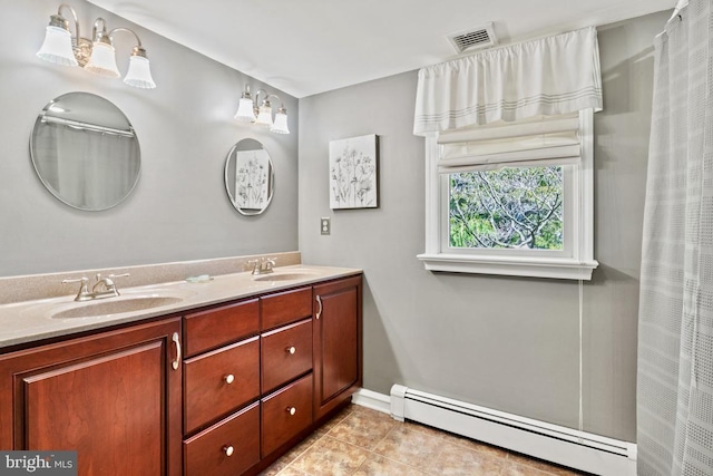 full bath featuring a baseboard heating unit, a sink, double vanity, visible vents, and tile patterned flooring