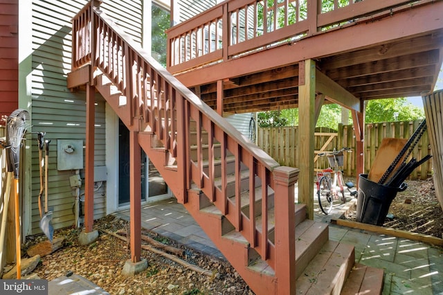 2102 Whisperwood Glen Ln, Reston, VA 20191 - view of patio featuring a wooden deck, fence, and stairs