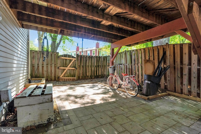 2102 Whisperwood Glen Ln, Reston, VA 20191 - view of patio / terrace featuring a gate and fence