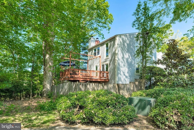2102 Whisperwood Glen Ln, Reston, VA 20191 - rear view of house featuring a chimney and a deck