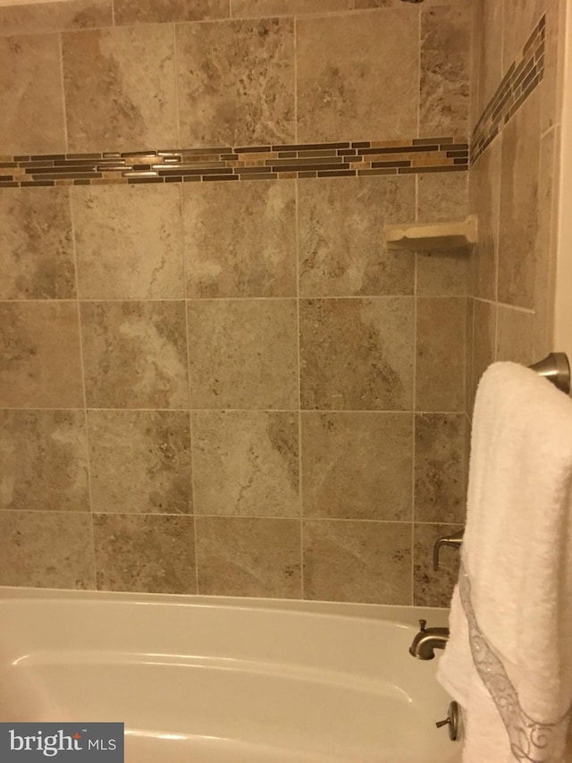 bathroom featuring  shower combination