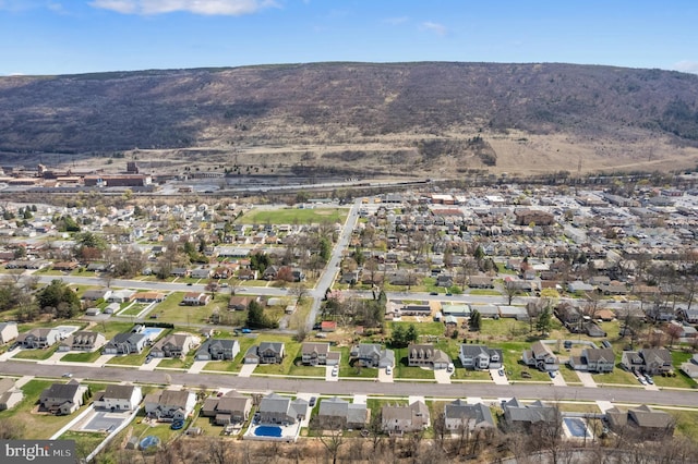 birds eye view of property with a residential view and a mountain view