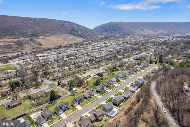 bird's eye view featuring a residential view and a mountain view