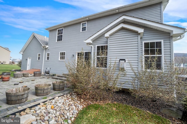 back of property with a patio area