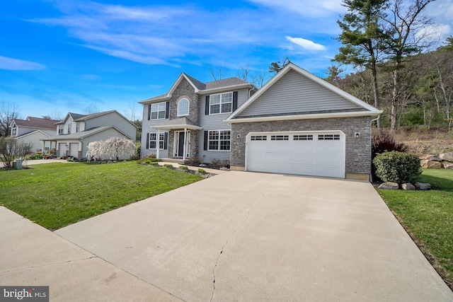 view of front facade featuring a garage, a front lawn, and concrete driveway