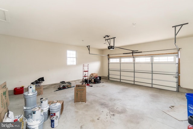 garage featuring a garage door opener