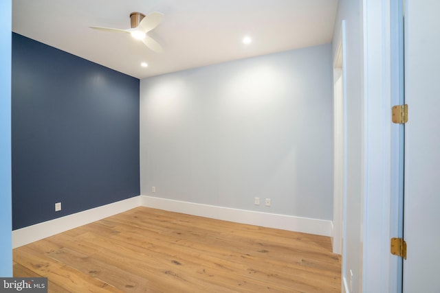 spare room with ceiling fan, baseboards, recessed lighting, and light wood-style floors