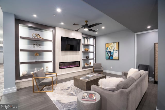 living area featuring a ceiling fan, recessed lighting, dark wood-style floors, and baseboards