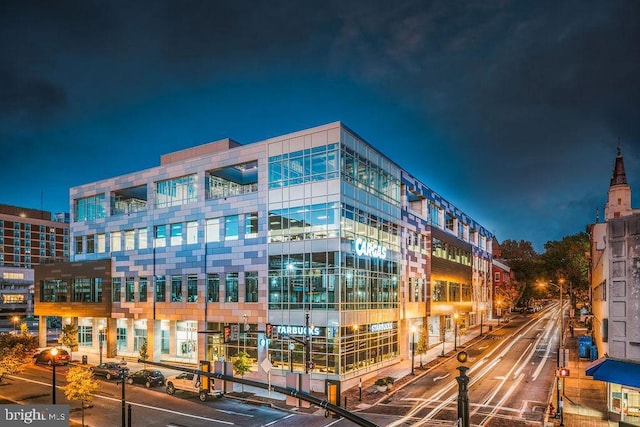 view of property at twilight