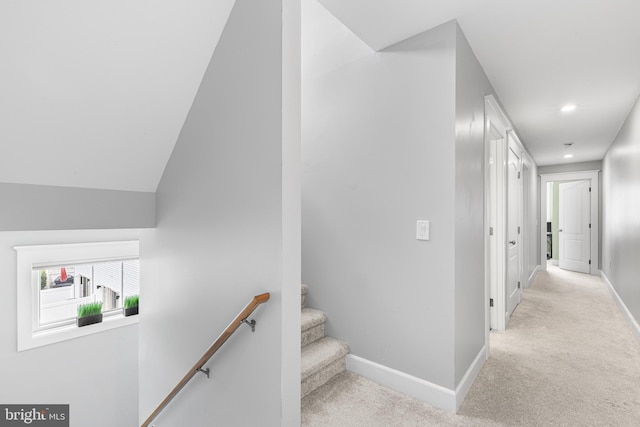interior space with recessed lighting, baseboards, and light colored carpet