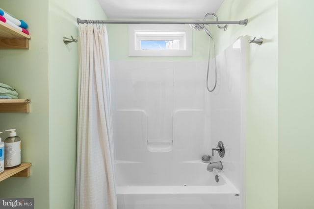bathroom featuring shower / bathtub combination with curtain