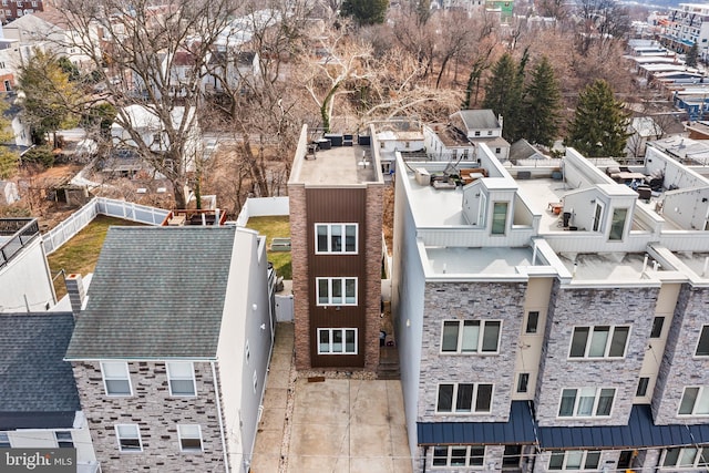 birds eye view of property with a residential view