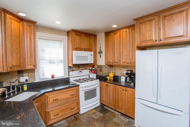36 S Clinton St, Doylestown, PA 18901 - kitchen with tasteful backsplash, recessed lighting, white appliances, brown cabinetry, and a sink
