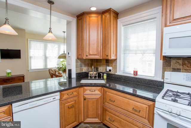36 S Clinton St, Doylestown, PA 18901 - kitchen featuring hanging light fixtures, white appliances, decorative backsplash, and a sink