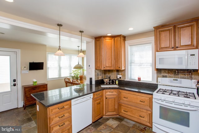 36 S Clinton St, Doylestown, PA 18901 - kitchen with tasteful backsplash, stone finish flooring, white appliances, and a peninsula