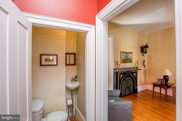 36 S Clinton St, Doylestown, PA 18901 - bathroom with baseboards, wood finished floors, and toilet