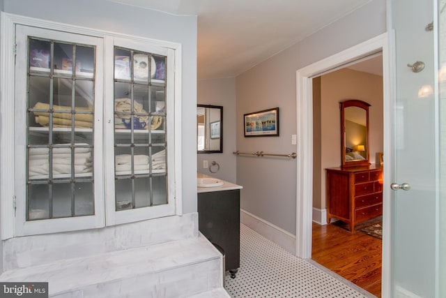 36 S Clinton St, Doylestown, PA 18901 - bathroom featuring wood finished floors, vanity, and baseboards