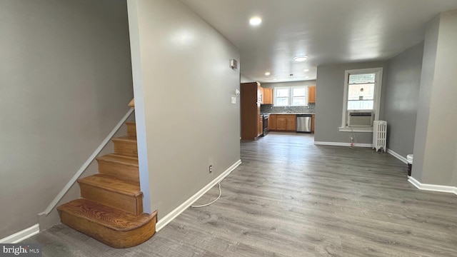 5915 Palmetto St, Philadelphia, PA 19120 - interior space with baseboards, recessed lighting, radiator, and wood finished floors