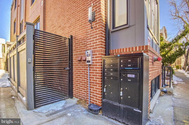 property entrance with brick siding
