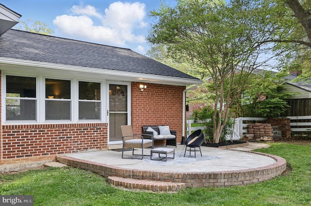 view of patio / terrace featuring fence