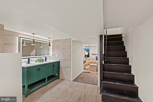 staircase with tile walls