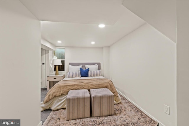 bedroom with baseboards and recessed lighting